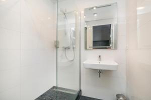 Koupelna v ubytování Edam Suites + 22 fotografií