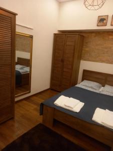 Posteľ alebo postele v izbe v ubytovaní Liszt Ferenc square Studio apartment