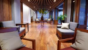 Posezení v ubytování Nara Residence Trang