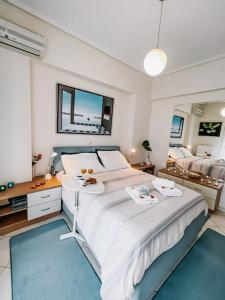 A bed or beds in a room at Mare Marina View 1 Még 37 kép