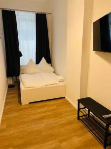 Postel nebo postele na pokoji v ubytování Gemütliches, neues 2. Zimmer Apartment am Ufer