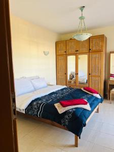 เตียงในห้องที่ Beautiful 3 Bedroom Apartment-Delta Sharm- Sharm El Sheikh