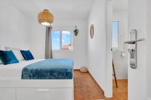 A bed or beds in a room at CASA DUNAS Még 31 kép