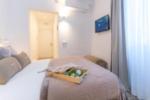 Postel nebo postele na pokoji v ubytování Encant de Alaior Boutique Hotel