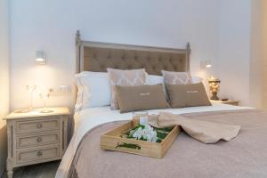 Postel nebo postele na pokoji v ubytování Encant de Alaior Boutique Hotel