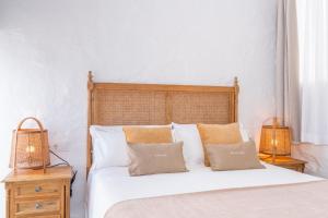 Postel nebo postele na pokoji v ubytování Encant de Alaior Boutique Hotel