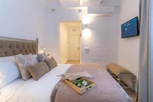 Postel nebo postele na pokoji v ubytování Encant de Alaior Boutique Hotel