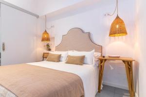 Postel nebo postele na pokoji v ubytování Encant de Alaior Boutique Hotel