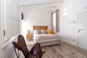 Postel nebo postele na pokoji v ubytování Encant de Alaior Boutique Hotel