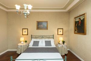 Säng eller sängar i ett rum på Aurelia Montana Luxury by Rental in Rome