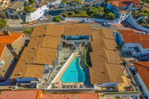 an overhead view of a building with a swimming pool at San Clemente Shores in San Clemente