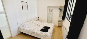 Postel nebo postele na pokoji v ubytování Le Wlérick 1 - Hyper centre - Au calme - Wifi