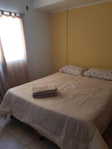 Postel nebo postele na pokoji v ubytování Gadano Suites