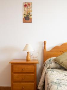 A bed or beds in a room at Casa Esperanza