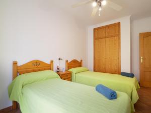 A bed or beds in a room at Casa Esperanza