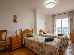 A bed or beds in a room at Casa Esperanza