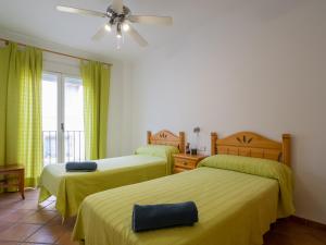 A bed or beds in a room at Casa Esperanza