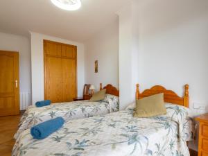 A bed or beds in a room at Casa Esperanza