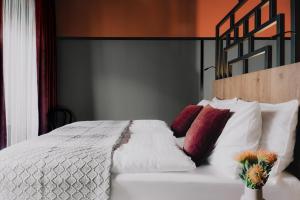 Voodi või voodid majutusasutuse WELTWIEN Luxury Art Apartments & Free Parking toas