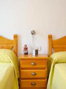A bed or beds in a room at Casa Esperanza