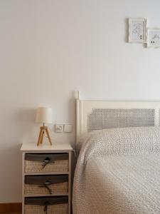 A bed or beds in a room at Casa Esperanza