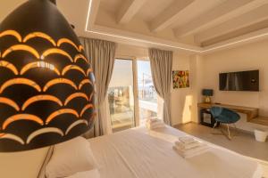 Ένα ή περισσότερα κρεβάτια σε δωμάτιο στο Villa Rocca - Rooms&SPA