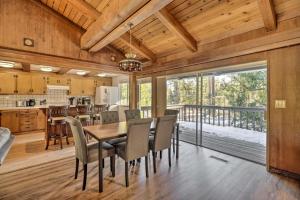 a kitchen and dining room with a table and chairs at Tahoe City Home with Hot Tub - 1 Mi to Beach in Tahoe City