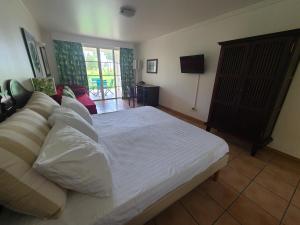 Postel nebo postele na pokoji v ubytování Studio village vacances sainte luce C6