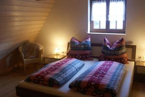 Postel nebo postele na pokoji v ubytování Ferienwohnung Hiemer