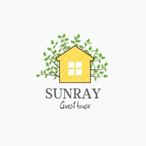 a logo for a guest house at SunRay Guest House-Hostel in Karakol