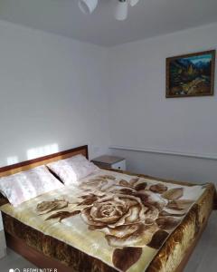 Ένα ή περισσότερα κρεβάτια σε δωμάτιο στο SunRay Guest House-Hostel