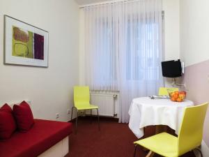 Posezení v ubytování Hotel Aigner