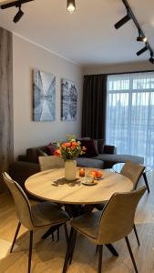 Posezení v ubytování DOM Boutique Apartments AURORA