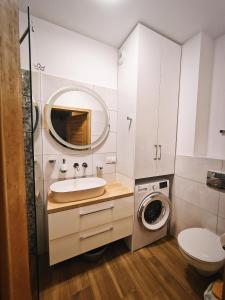 Et badeværelse på M&K Apartament Szafirowy - Wyspa Sobieszewska