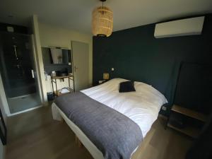 Postel nebo postele na pokoji v ubytování La Roselière + 32 fotografií
