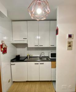 A kitchen or kitchenette at BlueSky Appartamento Monte Cervino Matterhorn