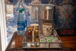 a tray with bottles of beer and drinks on a table at The Big Brickhouse in Mercer