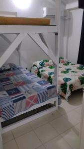 Säng eller sängar i ett rum på Apartamento Turístico Sea Garden