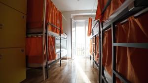 a hallway with bunk beds in a room at Summer Cádiz in Cádiz