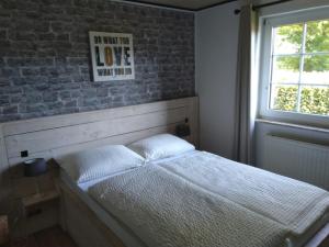 Postel nebo postele na pokoji v ubytování Heidehof Hellenthal + 37 fotografií