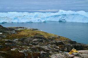 a group of icebergs in a body of water at Hotel Hvide Falk in Ilulissat