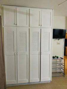 Televisyen dan/atau pusat hiburan di Club Caribbean Apartments