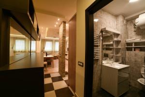 Ένα μπάνιο στο JollyKop Apartments +156 φωτογραφίες