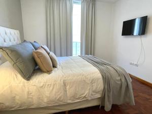 Ein Bett oder Betten in einem Zimmer der Unterkunft Balcarce Deluxe