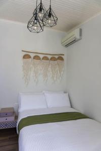 A bed or beds in a room at Casa Di Kapaka - New Villa in the countryside