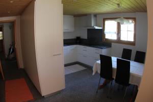 Kuchyň nebo kuchyňský kout v ubytování Ferienwohnung Rigoleth