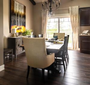 a dining room with a table and chairs at Back Home Bed and Breakfast in Membertou