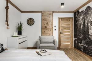 Posteľ alebo postele v izbe v ubytovaní Apartamenty Górskie Zacisze