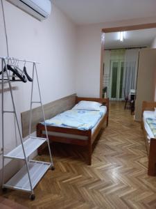 Postel nebo postele na pokoji v ubytování Apartman 2 szemèlynek