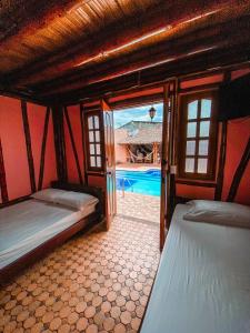 Postel nebo postele na pokoji v ubytování Hostal Victoria Club A&C